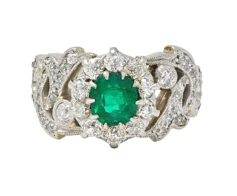 Edwardian 1.85 CTW Emerald Diamond Platinum 14 Karat Yellow Gold Scrolling Antique Halo Ring