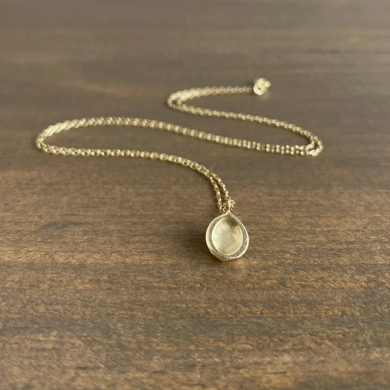 Gold Seed Pendant